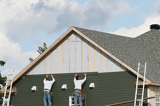 Professional Siding technician working in New Kent, VA